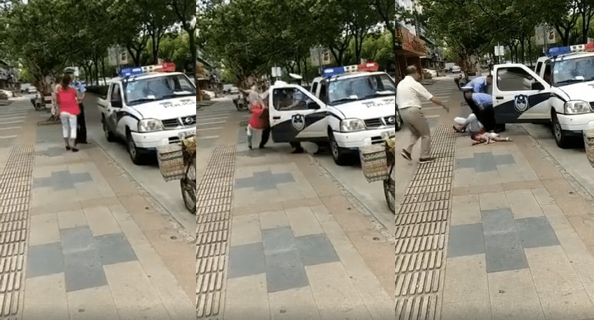 Polizist schubst Frau und Kleinkind zu Boden